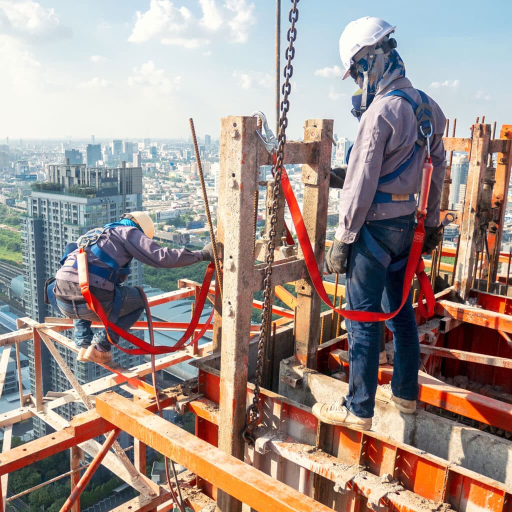 Construction worker wear standard personal protective equipment dismantle steel structure